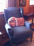                         Blue fabric wing-back chair
