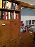                      Large wall unit/desk; many books