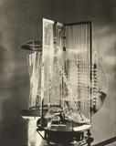 Lot 1039:  PHOTOGRAPH OF LASZLO MOHOLY-NAGY WORK: Light-space Modulator(1922-1930), Photograph, 10'' x 8'', stamped verso from the Howard Wise Gallery, NYC. Est. $800/1200**
CONDITION: Scattered minor creasing, marking in upper margin, minor handling creases, sold as is.