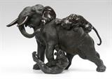 Lot 1068:  MASSIVE MEIJI PERIOD JAPANESE BRONZE ELEPHANT & ATTACKING TIGERS SIGNED GENRYUSAI SEIYA: A finely detailed period bronze sculpture depicting a large muscular elephant under attack by two tigers. Meiji period marking on underbelly of the elephant. 19''h. x 27 1/2'' x 13 1/2'' w. Est. $3000/5000**
CONDITION: Unexplained flaw to tusk, several minor casting flaws.