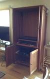Cherry media cabinet interior - note retractable upper doors.  With Phillips DVD/CD player on lower shelf (hard to see)