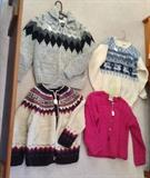 A sampling of the sweaters (clockwise from top left:  Tuak from Canada, Icelandic sweater, pink Connemara from Ireland & handmade sweater (Peru?)