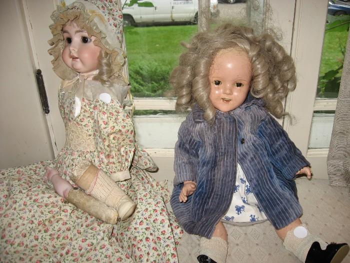 Shirley Temple doll on right