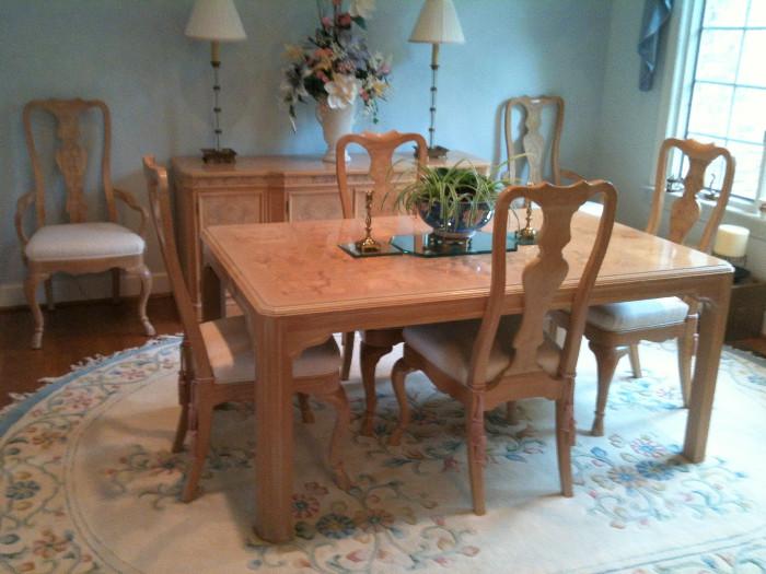 Heritage table (plus 2 leaves), 6 chairs (2 arm, 4 side) and matching buffet, candlestick lamps, floral arrangement & oval floral rug