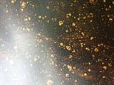 Close up of oil drip lacquer finish on table