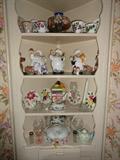 CORNOR CABINET FILLED WITH TEAPOTS AND KNICK KNACKS