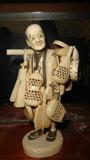 Tokoyo school carved Ivory figure of a man