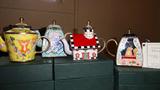four wonderfull minture enameld teapots