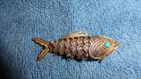 Gold fish pendant w/ turquoise eyes