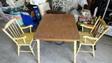 vintage kids table and two chairs in yellow paint