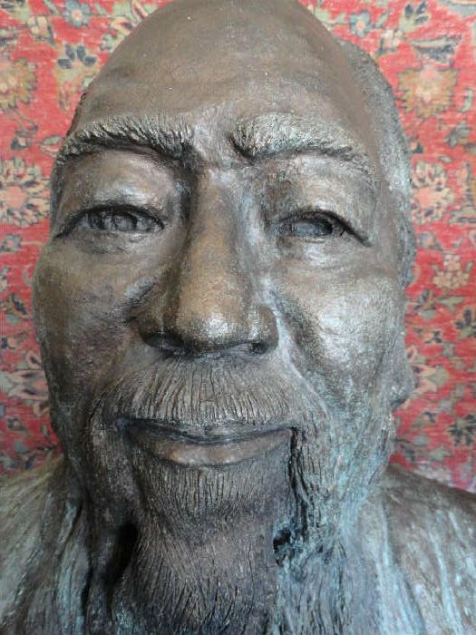 Asian man sculpture by Leonard Ross