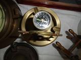 brass ash tray and compass with ships wheel