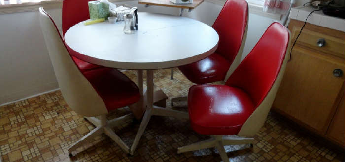 great retro white 60's table with four red bucket chairs