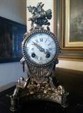 Atique silver resist french table clock, has a wonerful soft bell strike