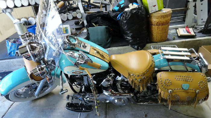 Vintage tricked out customized southwestern style Vintage tricked out customized southwestern style Harley Davidson motorcycle with 23,973.2 original milage, we will be allowing presale looks by appointment for cars and motocycles only please email crowncty@aol.com