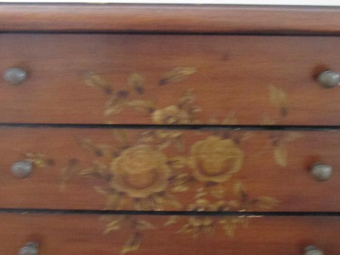 Close up of french chest of drawers