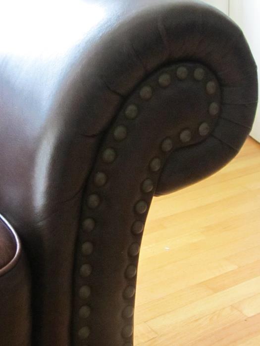 Leather sofa arm with studs