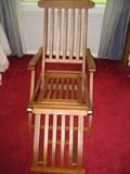 oak deck chaise lounger from the USS Amsterdam. Has 2 brass plates from the ship.