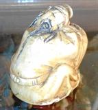 Mammoth Ivory figure of Chinese Man in repose