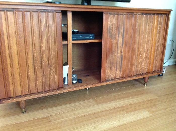 Mid century cabinet currently being used as a media cabinet