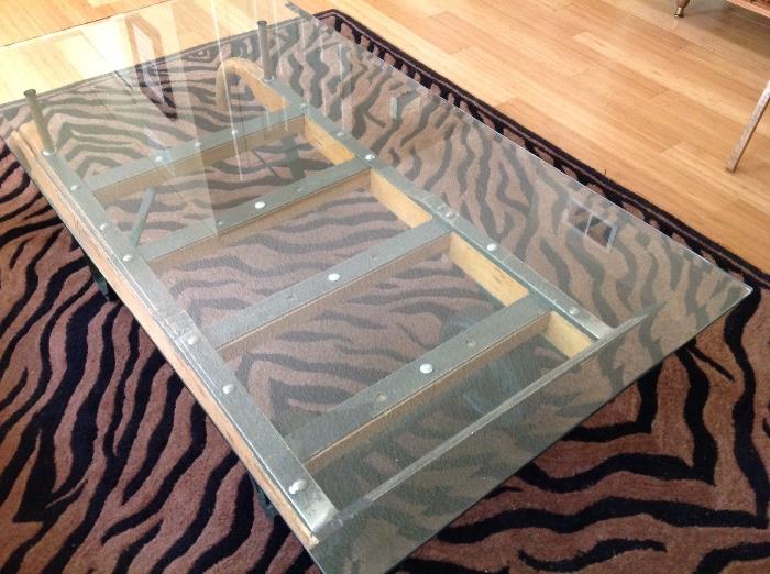 Industrial coffee table, brown and black zebra area rug