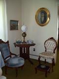 Eastlake table $200.00, cream chair  $125.00, lamp--$125.00