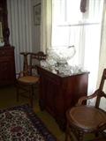 chest $225.00, punch bowl w/stand, 12 cups, ladle--$75.00,  pr. of chairs $65.00