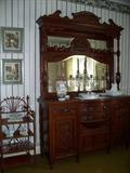 sideboard is 2 pieces $900.00, wicker shelf $200.00