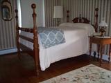Campbellsville cherry bed $500.00, side table $125.00, rug $100.00