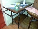 Hardwood & metal Rolling bar buffet w/ glass top, caned lattice detail under glass.  $60