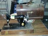 Antique Singer sewing machine with hard shell case
