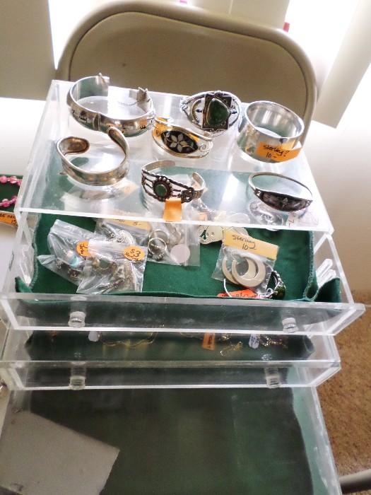 Sterling, .925 and a few 14K gold