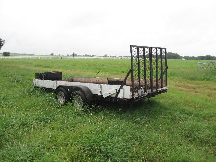 Flat bed trailer with ramp gate