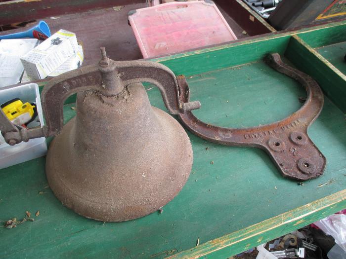 Cast Iron Bell and yoke, marked USA and Crystal Metal.   A typical old bell found at old country school buildings. 
