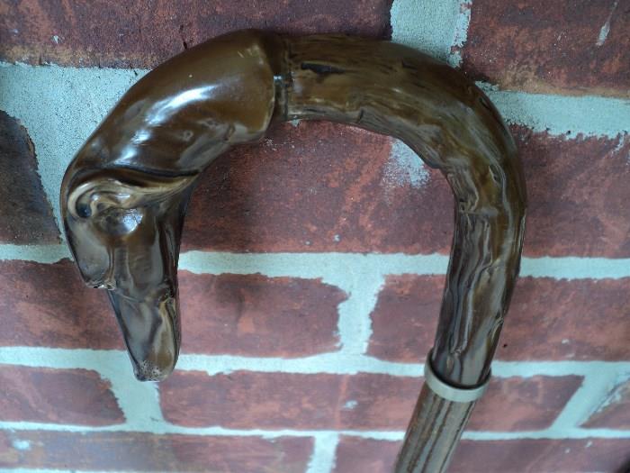 Highly unusual dog's head walking stick -- looks like a grey hound or lab to me!  Color is a nice warm brown --- super piece!!!