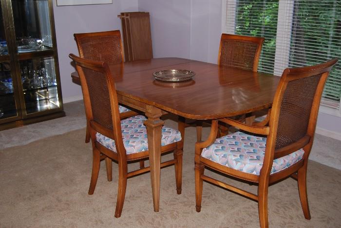 Drop leaf dining table with 3 leaves, pads, 4 chairs