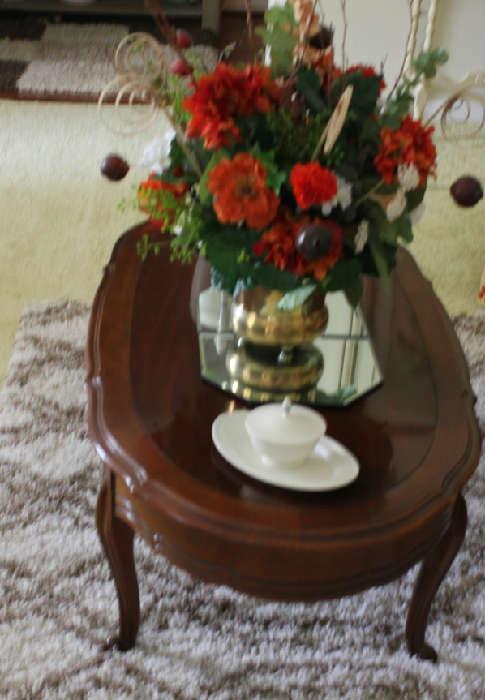 The mahogany living room coffee table.  Has two matching end tables.