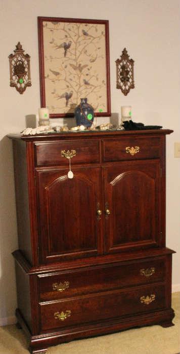The highboy chest that goes with bedroom suit of king 4 poster bed.