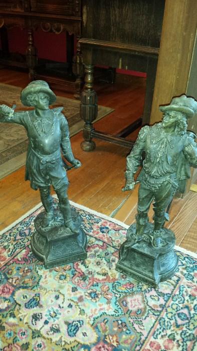 6 different bronze statues or bookends.