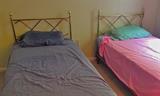 Twin Beds with Brass Headboards