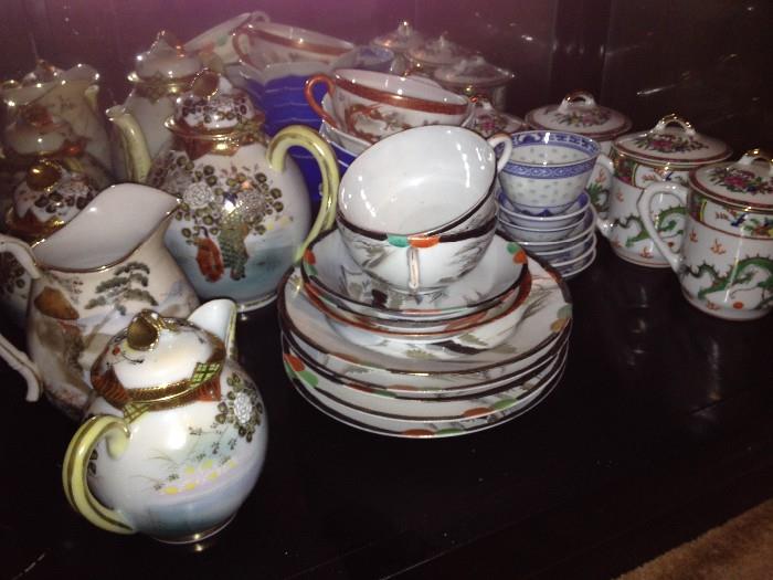 Vintage ceramic tea pots, dishes, pitcher and others