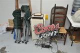 folding chairs, Coors Light neon beer sign, file cabinet 