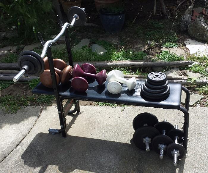 Sturdy and extensive weight set and bench.