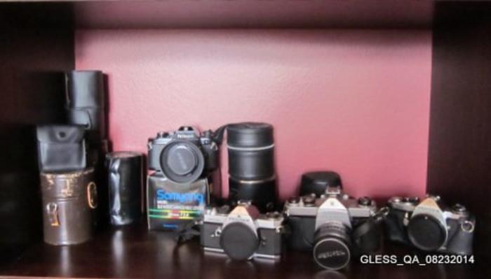 Pentax 35 mm cameras (ILX, MX, ME, SP1000), Camera Lens (Cambron, Promaster, Hanimar, Pentax -M Macro SMC 100mm, Tokina 500mm, Fujinon 55mm and more).