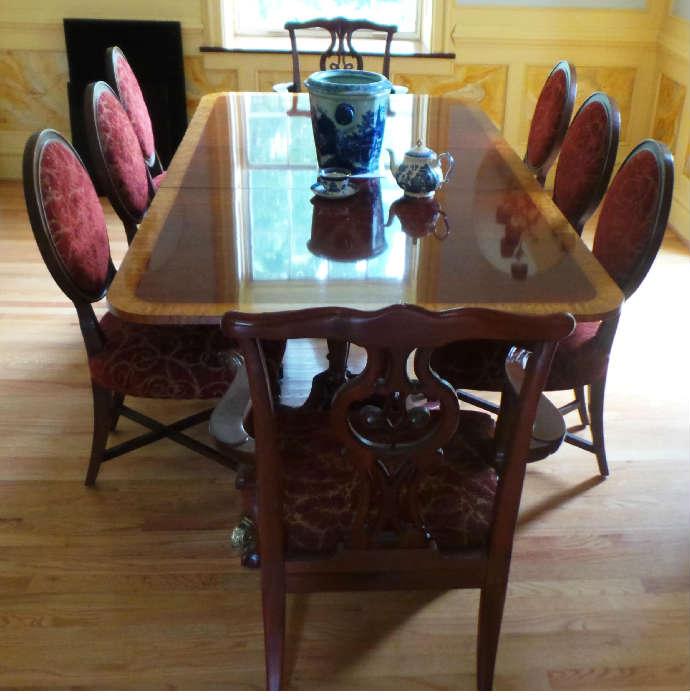 Baker Historical Charleston Collection Mahogany Satin Banded Dinning Table (3 Leaves and Pads), and 8 Baker Chairs. 