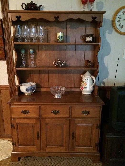 Pretty vintage hutch with hearts cut out. 