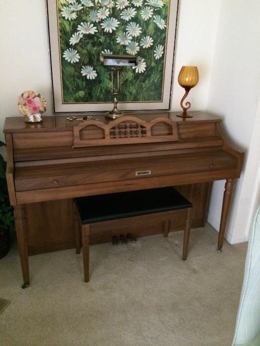 Whitmore piano in excellent shape with bench. Needs tuning.