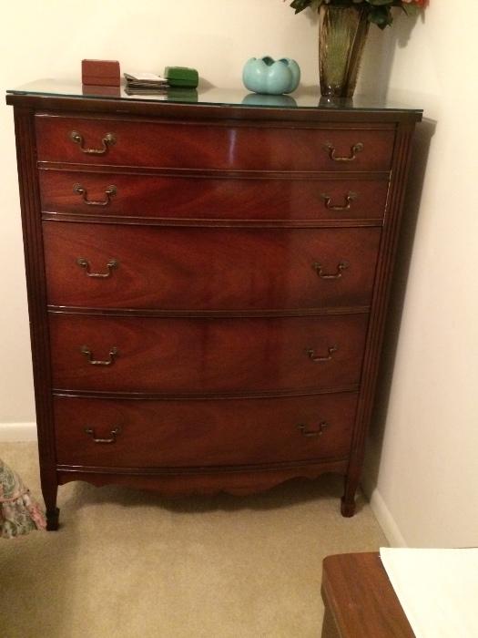 Gorgeous antique Dixie furniture chest of drawers. Excellent condition. Wood grain is outstanding and glass has been cut to fit and protect top.