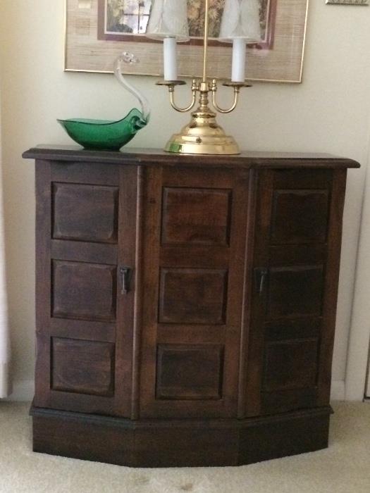 Very elegant yet simple occasional table. Solid wood. Lamp is gorgeous brass with heavy glass lamp shades. Light one side or the other or both.