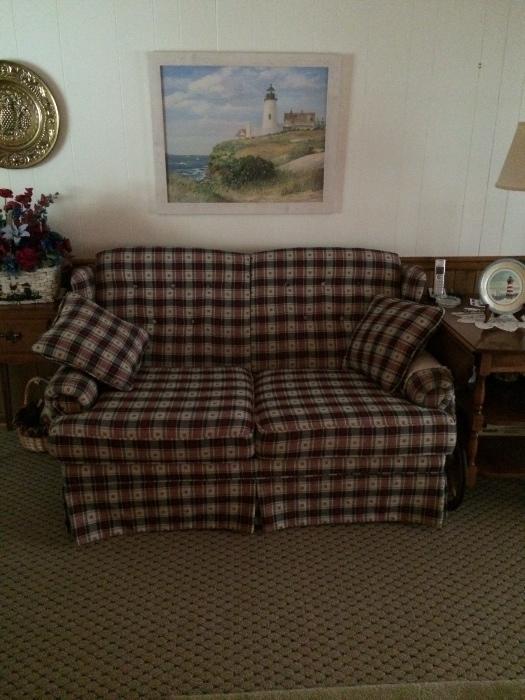 Casual big plaid love seat, clean and attractive.